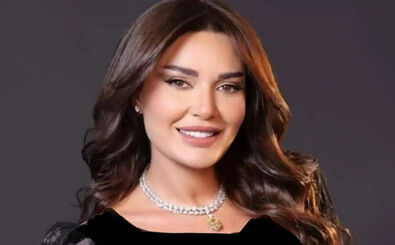 عکسی عاشقانه از زیباترین خواننده زن عرب و همسرش