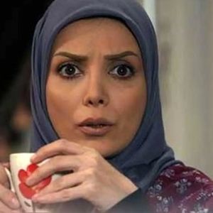 تصویری از نوزادی رویا میرعلمی در آغوش پدرش