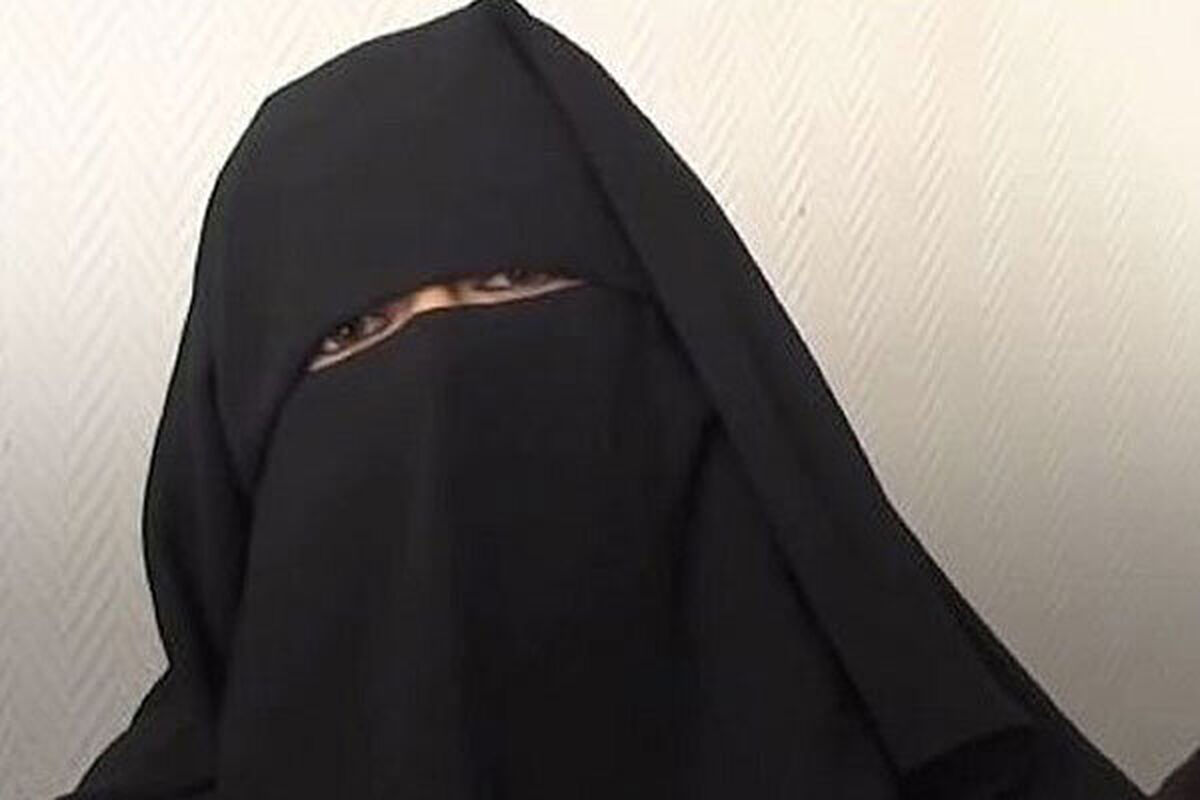 عکس یک زن مسن چادری در حال موتورسواری سوژه شد