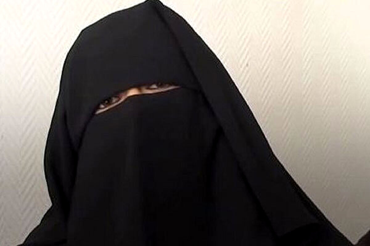 عکس یک زن مسن چادری در حال موتورسواری سوژه شد
